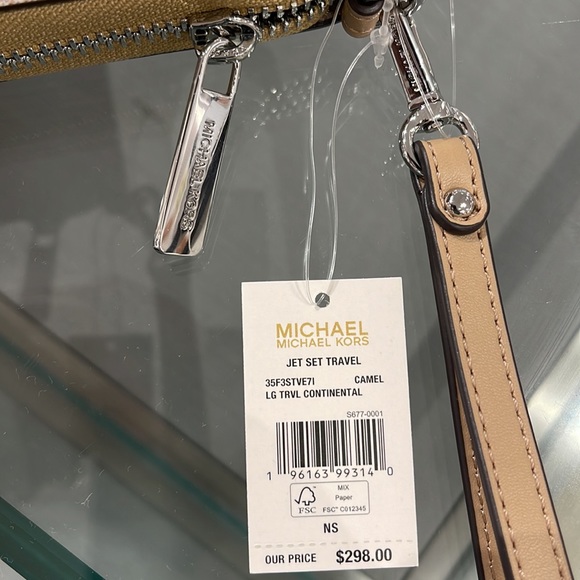 MICHAEL KORS Leather Continental Phone Holder Wristlet Wallet 
Camel 
NWT - Picture 14 of 16